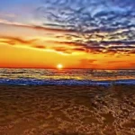 Sunset di Sanur Bali: Langit dan Laut Menyatu dalam Lukisan Alam